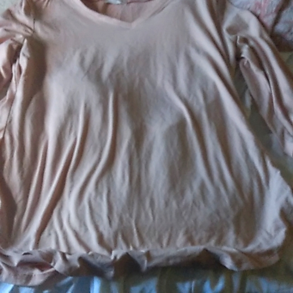 A cram color shirt